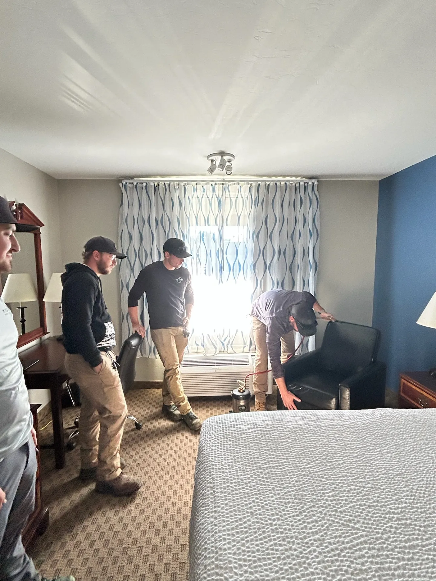 Hydra crew inspecting a hotel room for landlords and short-term rental hosts